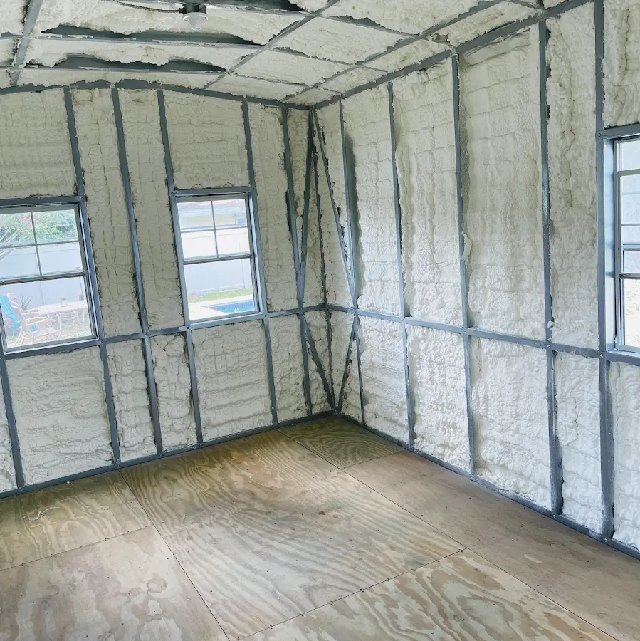 Closed-cell spray foam insulation applied to wall cavities in a residential project in Cape St. Claire